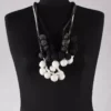 krista larson collier celestial necklace chez abby maud en coloris white black et faded black en gros plan